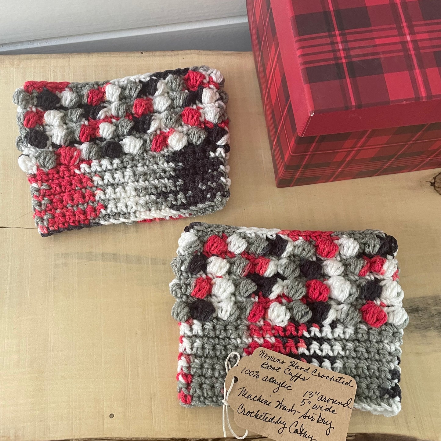 Hand Crocheted Boot Cuffs in Red Black & Gray Marble Puff Stitch Knit Winter Fall--displayed flat