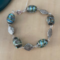Colorful Swirled Glass Chunky Bracelet 8.25" Textured Mixed Metal Blue Black Silver Copper Multicolor Coastal Mermaid