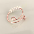 Single Adjustable Fidget Ring in Rose Copper/Pearlescent White Bead Anti Anxiety Stress Spinner Wire