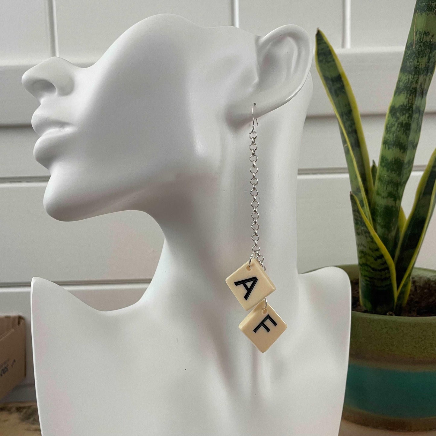 AF Long Statement Earrings 4.75" Letter Game Tile Cream Resin Repurposed Upcycled Fun Game OOAK, displayed on a solid white mannequin