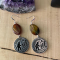 Handmade Bigfoot earrings with swirled jade stones in autumn colors