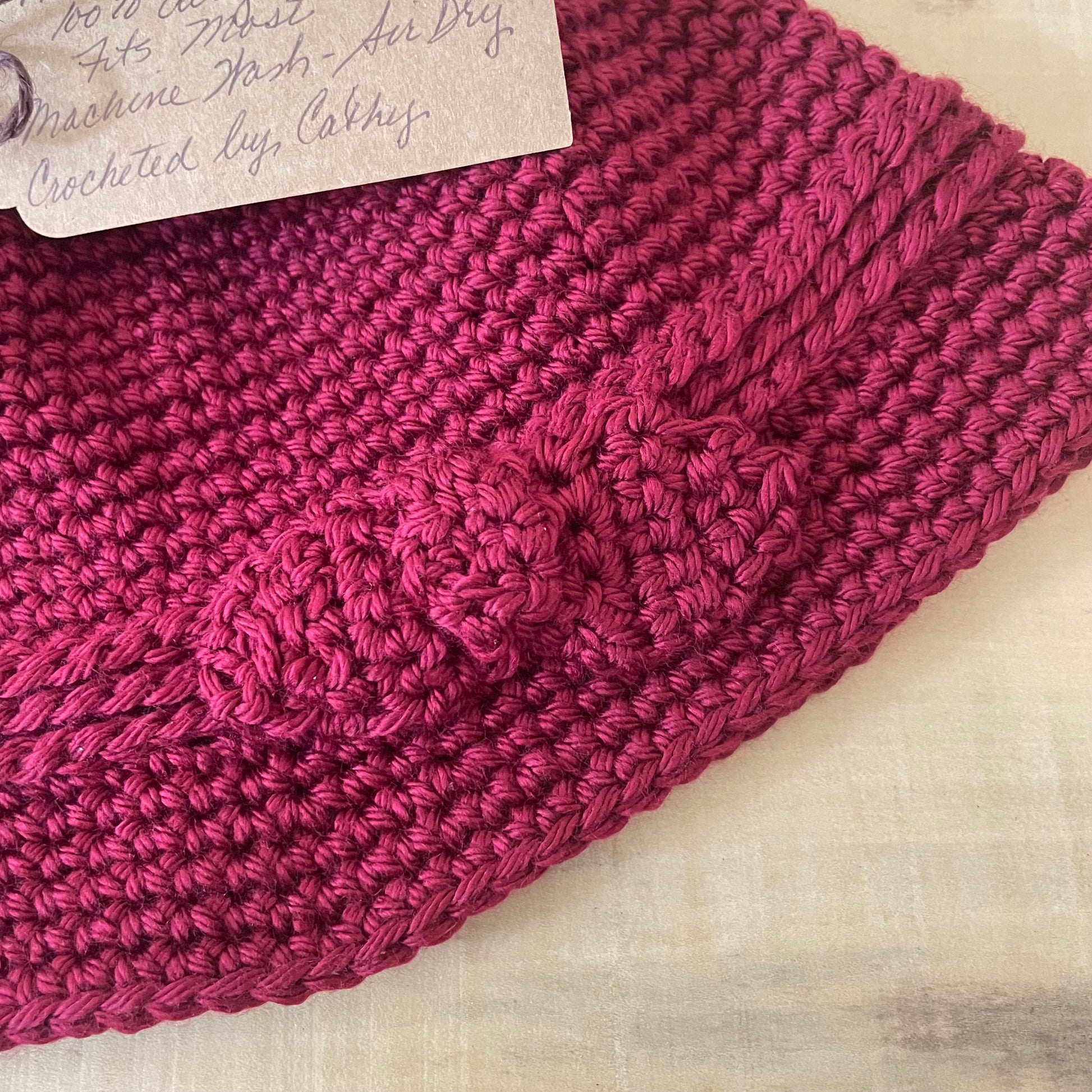 Vintage Retro Style Cloche Hat with Bow Accent in Red Wine Maroon Hand Crocheted Knit Fall Winter Bohemian Boho--closeup view of bow