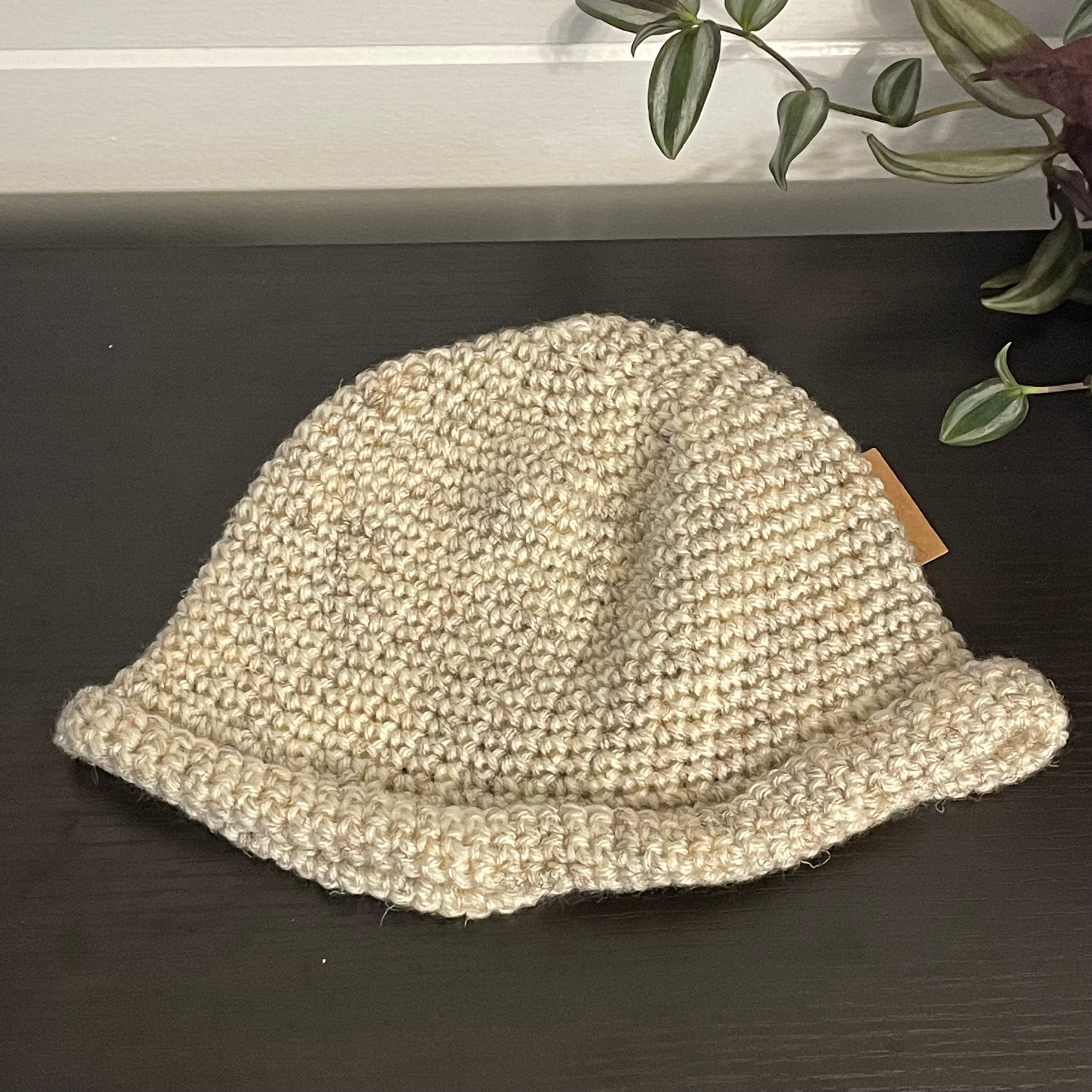 view of hat laying flat on black table