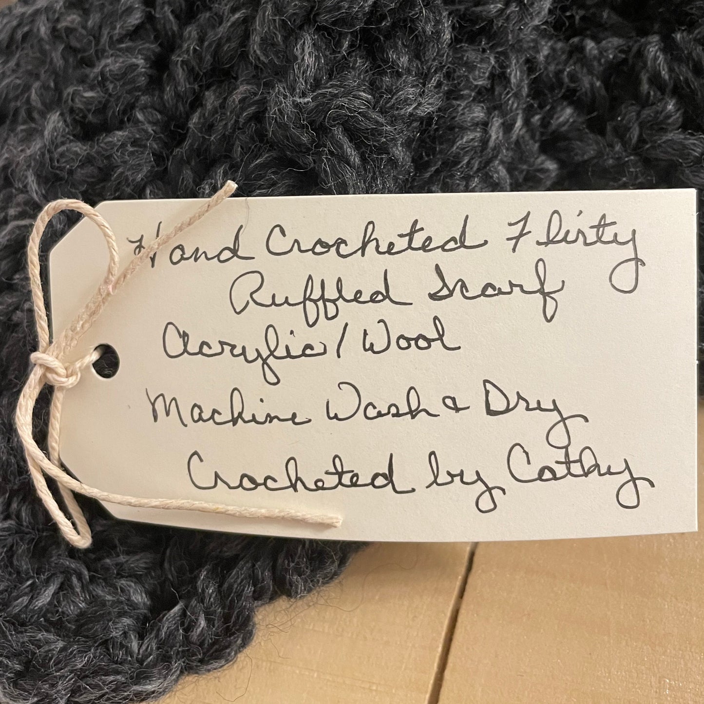 close up of tag, details in product description