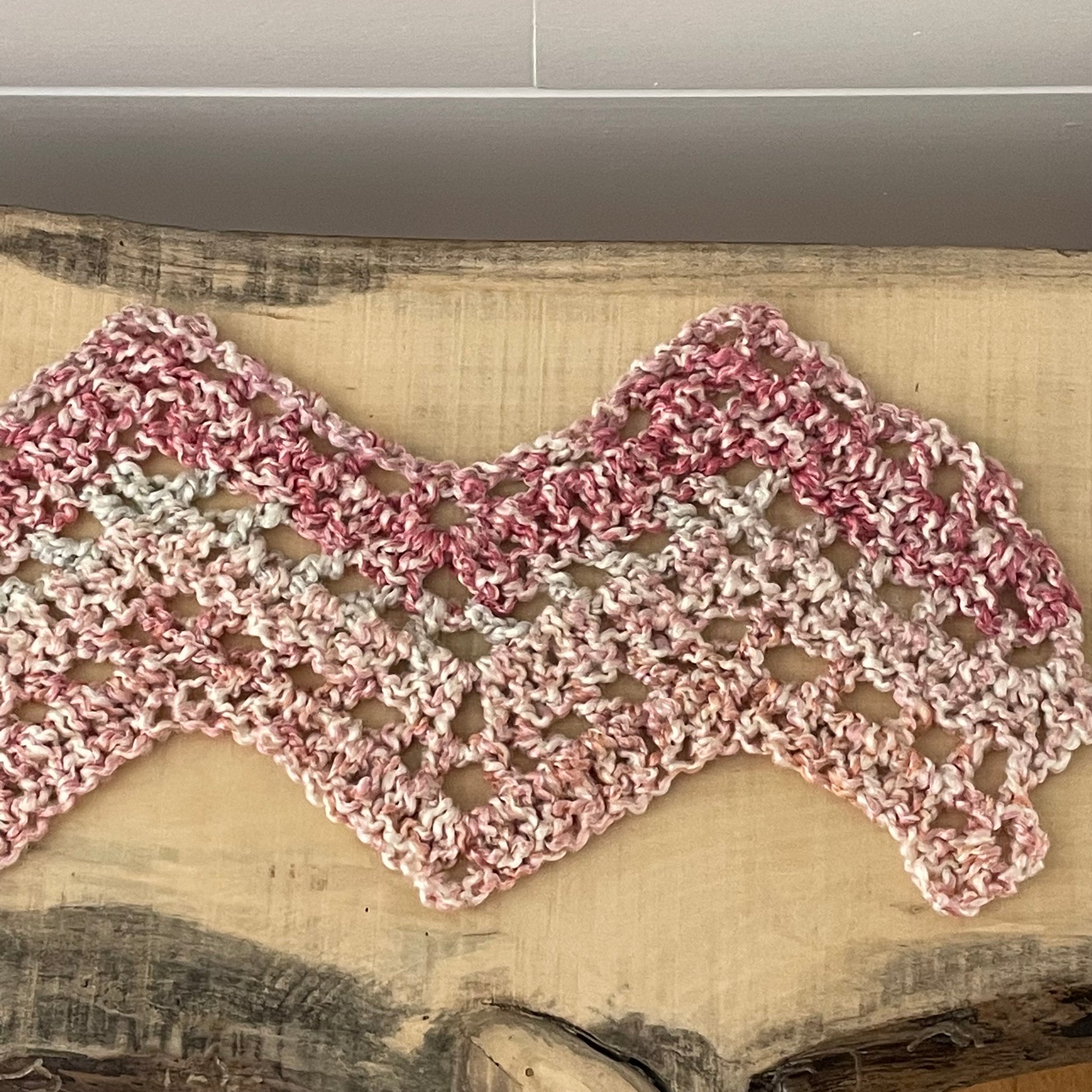 closer view of crocheted diagonal pattern of scarf.