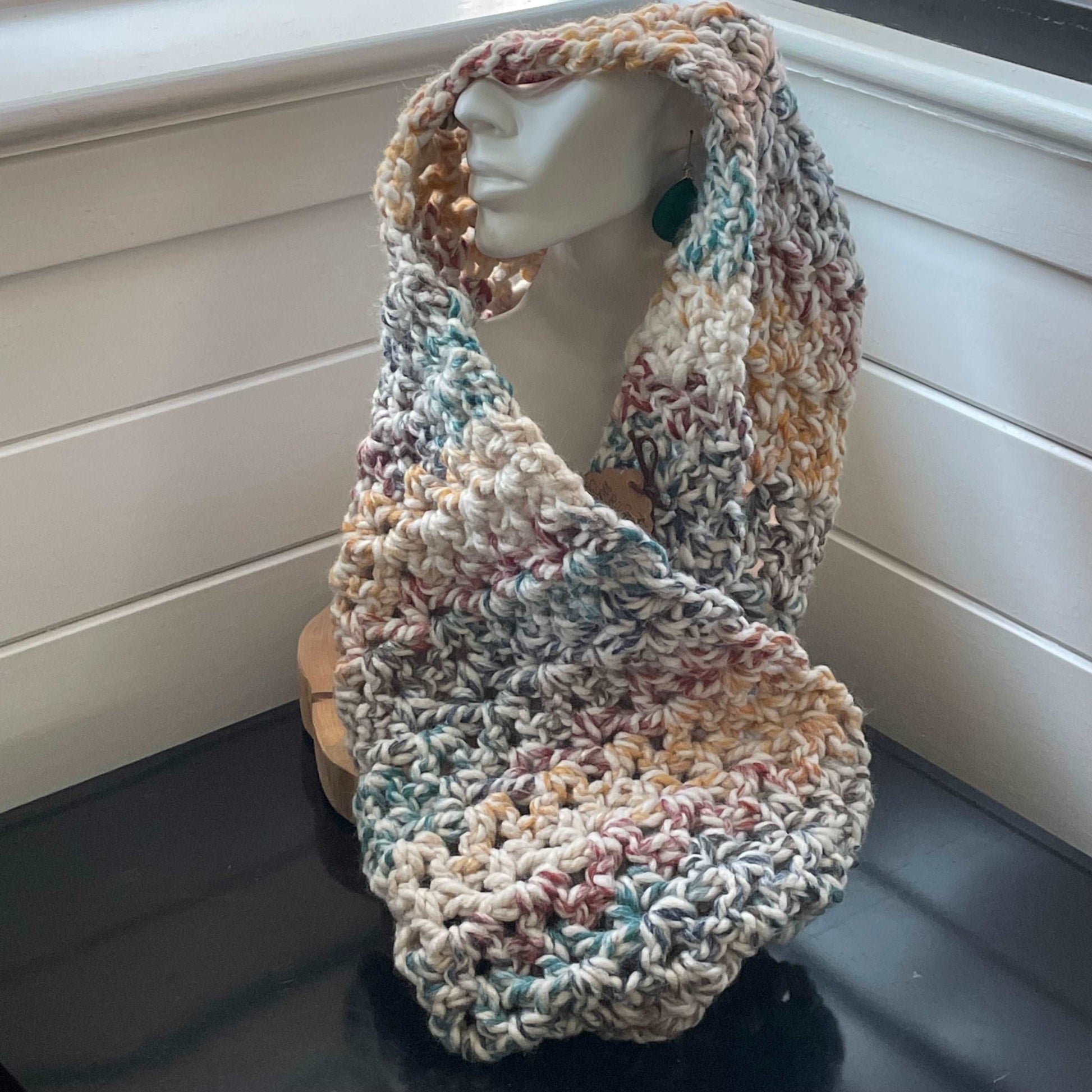Shown worn over head for extra warmth