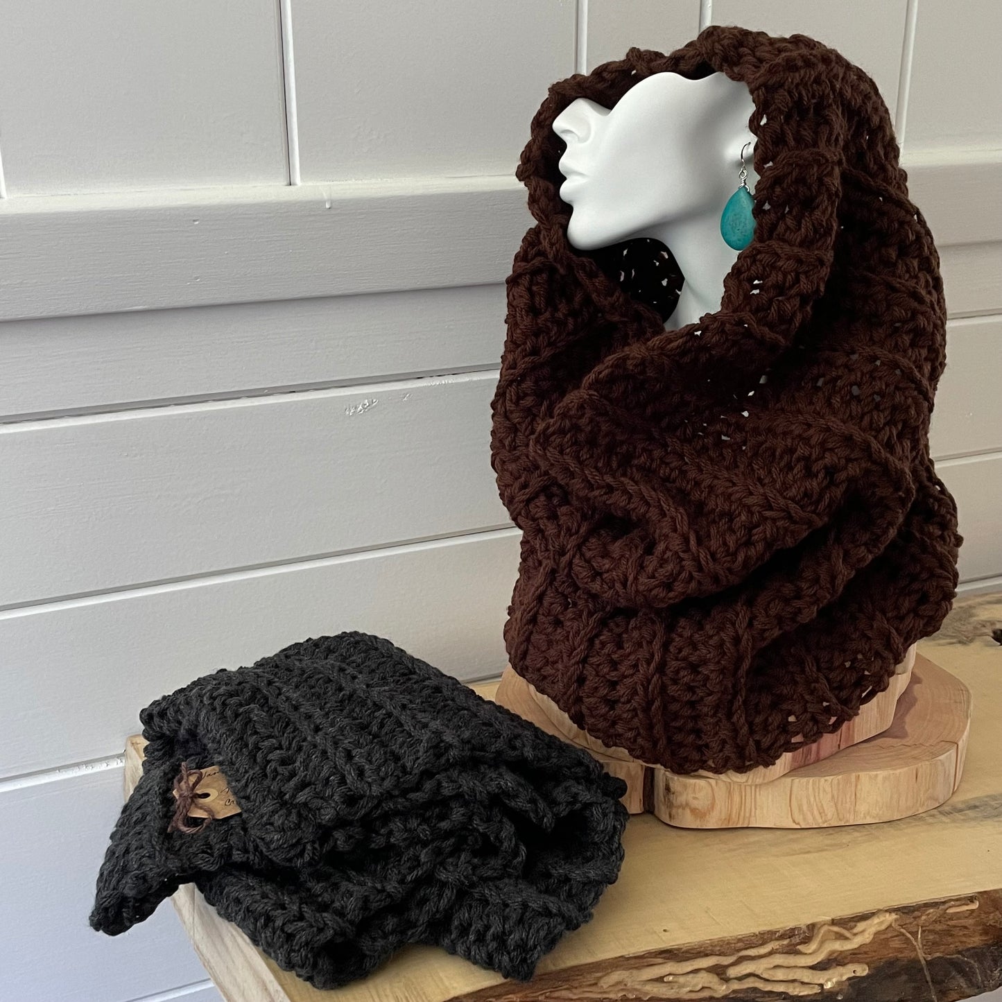 charcoal displayed alongside brown cowl scarf