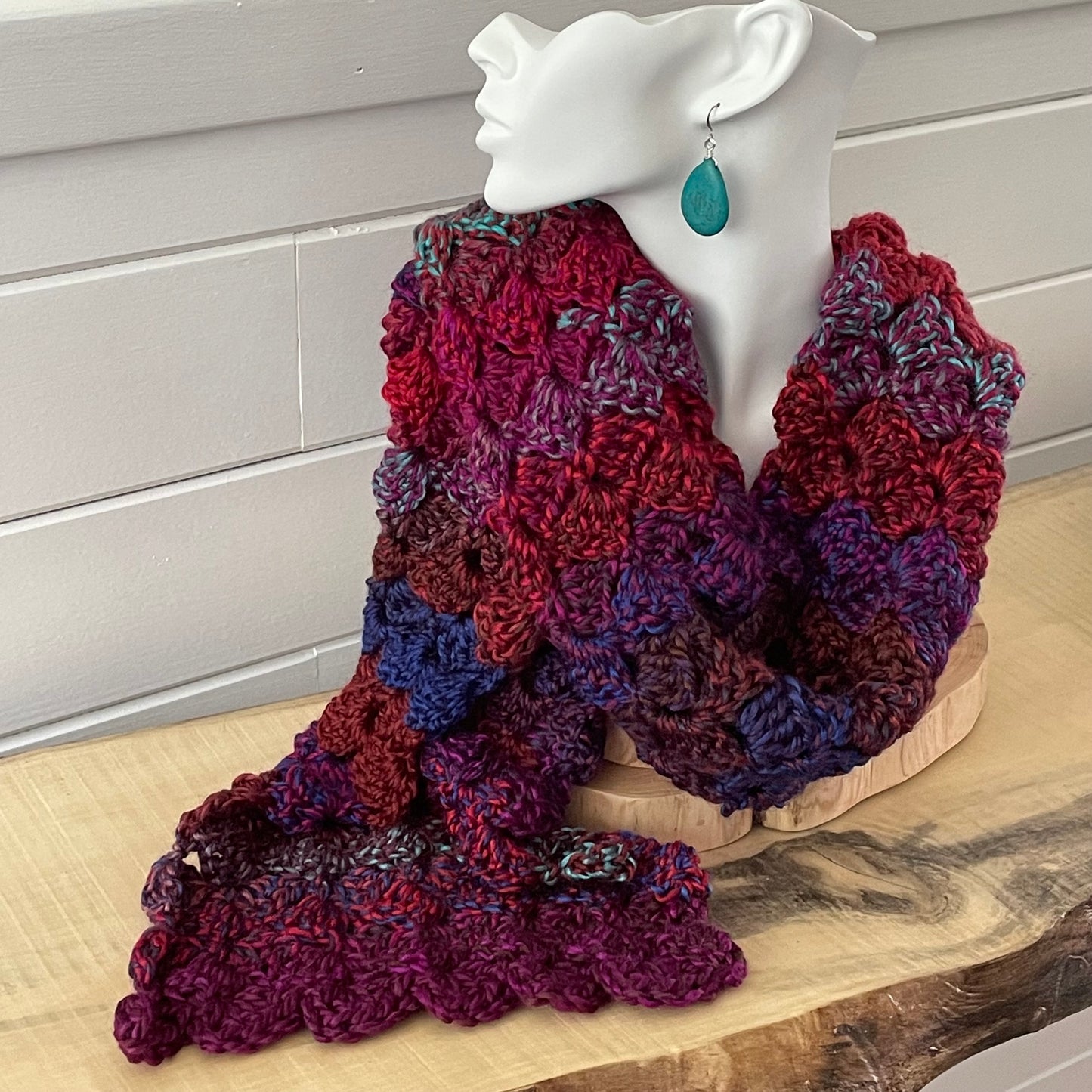 Extra Soft Marbled Gemstone Long Scarf Hand Crochet Knit Unisex Men Women Retro Vintage Style Red Pink Blue Purple modeled on a white faux bust