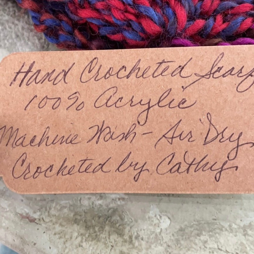 close up of tag--% acrylic, machine washable/air dry, crocheted by Cathy