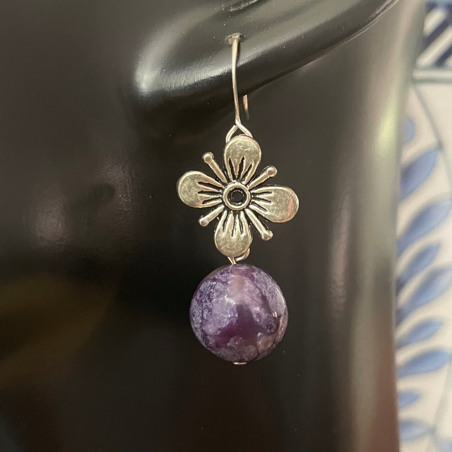 Antiqued Flower & Dark Purple Marbled Jasper Drop Earrings 1.5" Spring Summer Floral close up against solid black model form