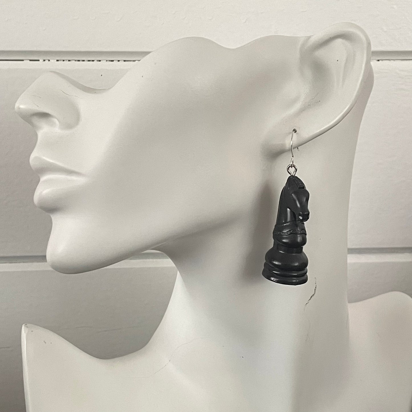 single earring on mannequin head