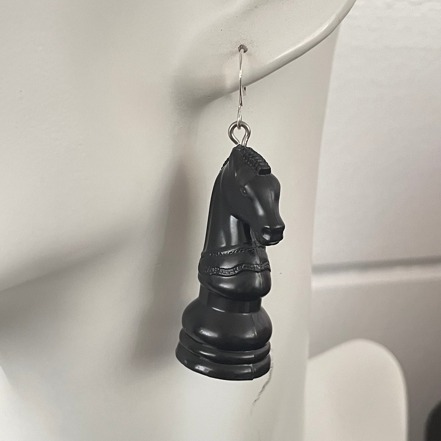 Black Chess Knight Horse Earrings 2.25”Lightweight Repurposed Upcycled, closeup of earring on mannequin