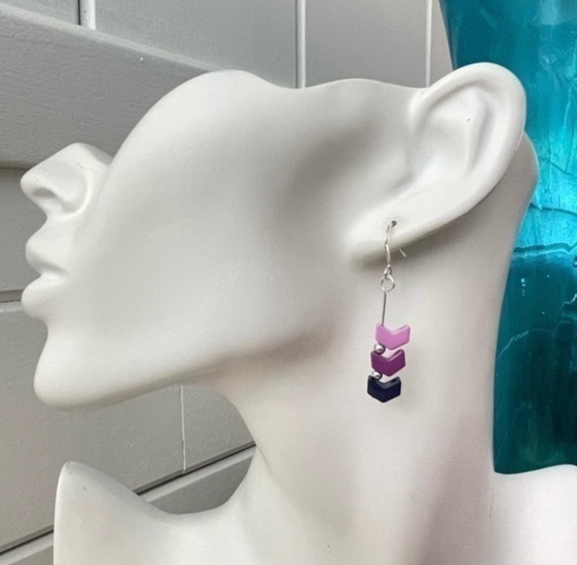 Bi Flag Metal Chevron Drop Earrings 1.75" Pink Purple Blue LGBTQIA Pride Ally Colorful--single earring displayed on mannequin head
