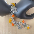 Layered Chunky Metal Butterfly & Flower Bracelet 7.5" Yellow Orange Green Spring Summer
