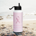 A stainless steel water bottle with a pink ribbon design and the message 'F*ck Cancer' in Morse code on a beach rock
